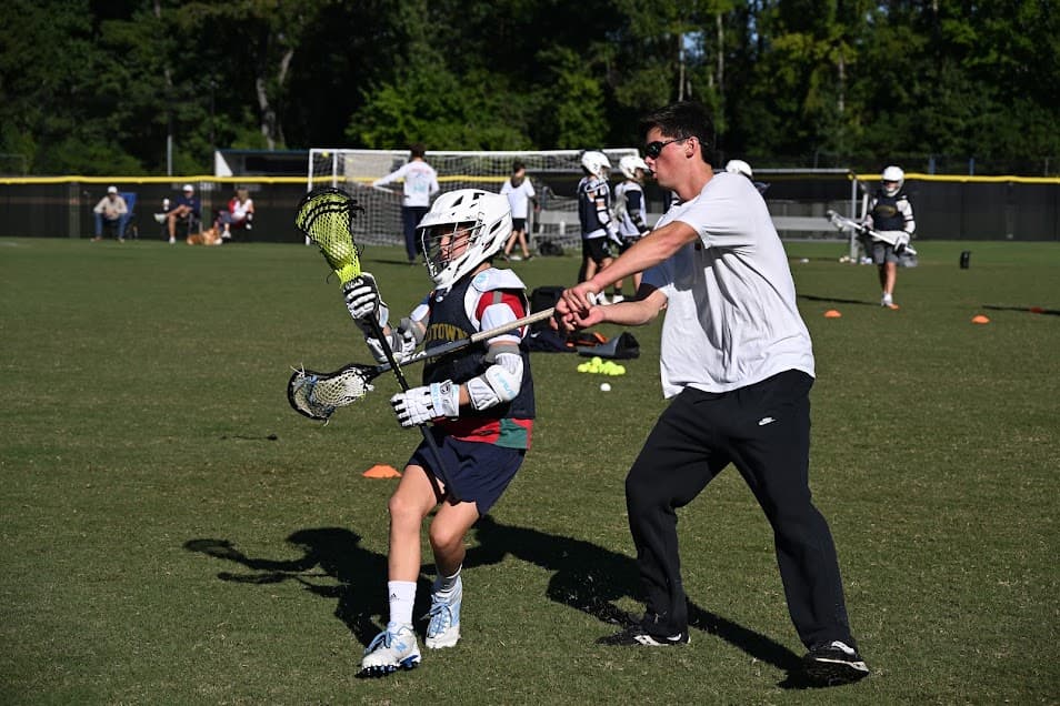 MRL player receiving direct coaching during a field session